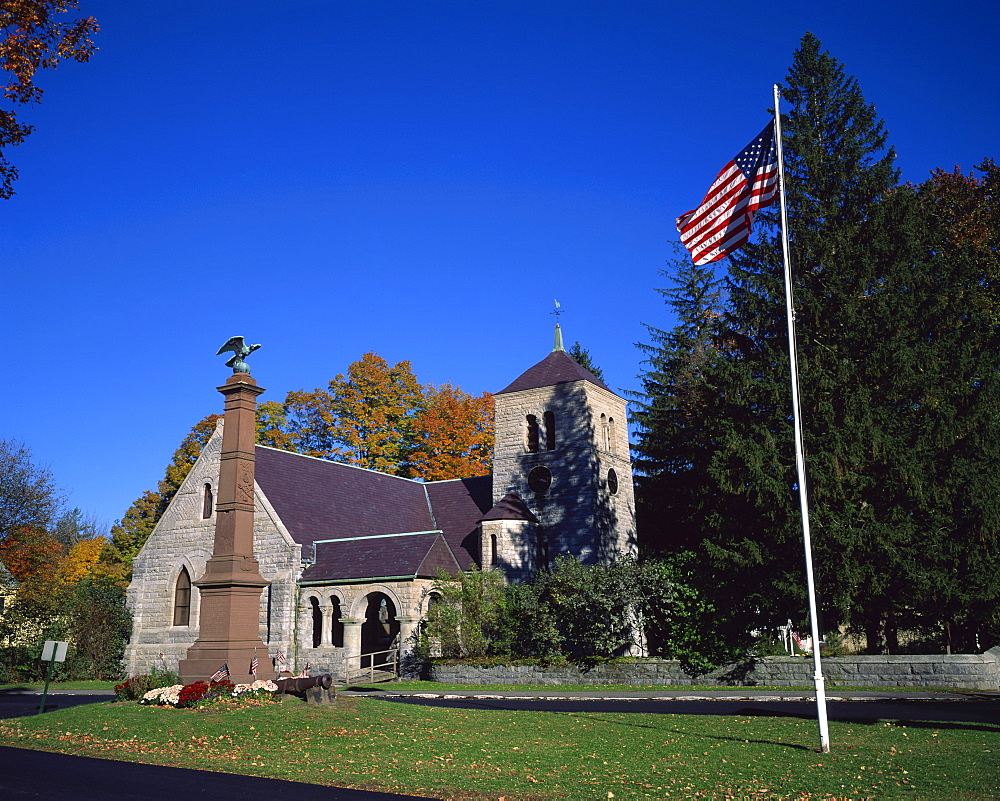 American flag flies outside St. Pauls church on the main street of Stockbridge, a town in the Berkshires, Massachusetts, New England, United States of America, North America