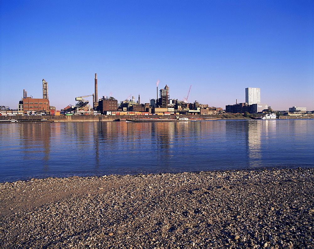 The River Rhine and Bayer AG, Leverkusen, North Rhine-Westphalia (Nordrhein-Westfalen), Germany, Europe