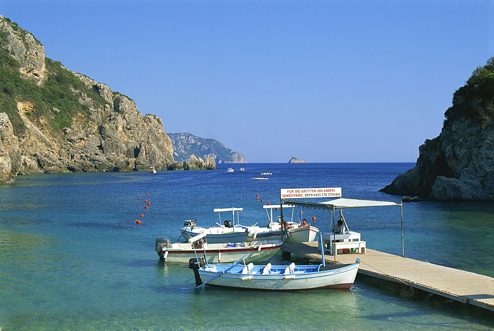 Moored boats at a jetty, Paleokastritsa, Corfu, Ionian Islands, Greek Islands, Greece, Europe