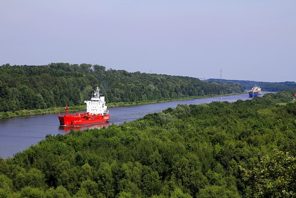 Freight Ships on Kiel Canal going near Hochdonn, Dithmarschen, Schleswig-Holstein, Germany, Europe