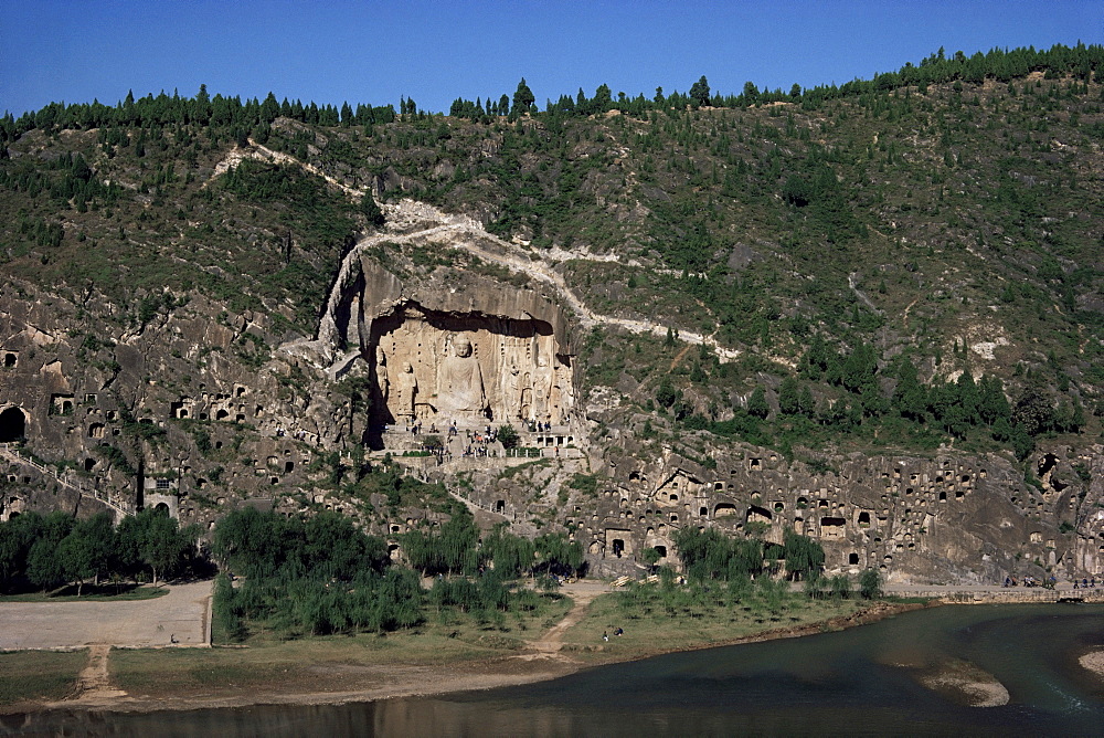 Buddhist cave temples, west shore of the Yi River, Longmen, Hsien 672AD, China, Asia