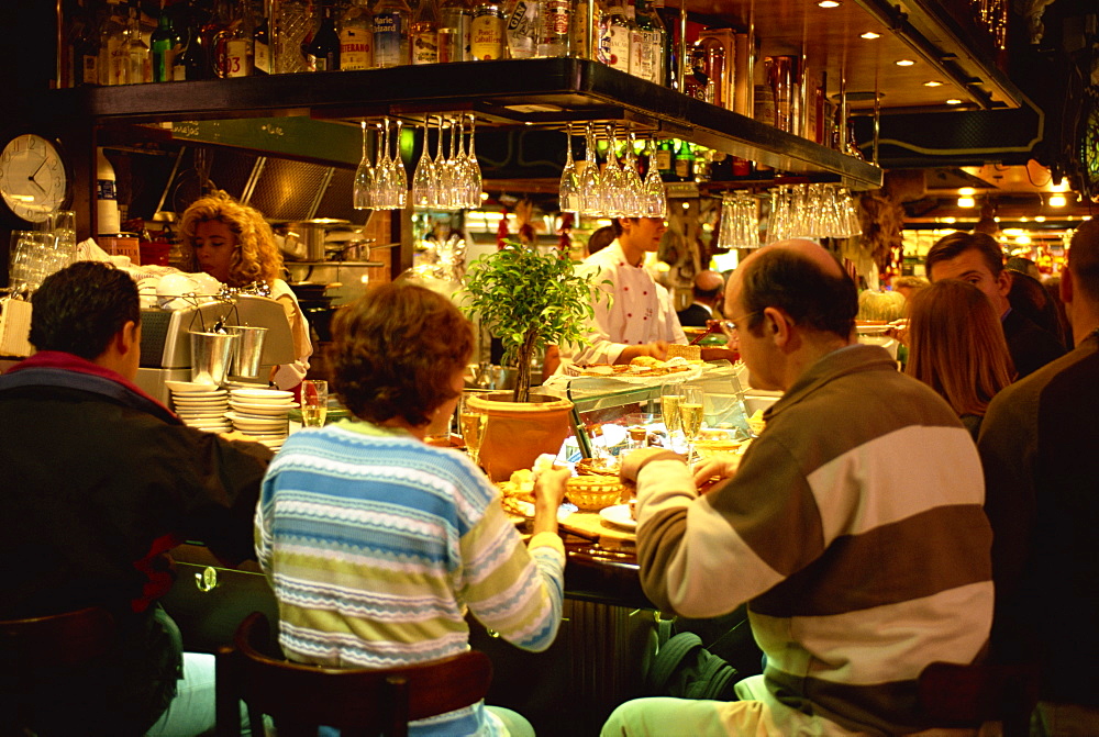 Eating out at a cafe in the Boqueria market, La Rambla, Barcelona, Catalona, Spain, Europe