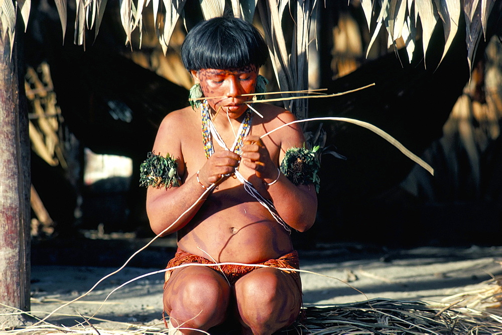 Yanomami with vine for basket making, Brazil, South America