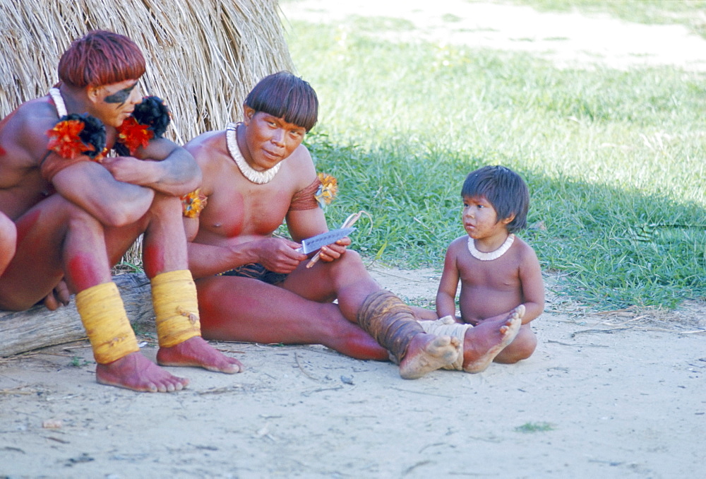 Kamayura Indian men and child, Xingu area, Brazil, South America