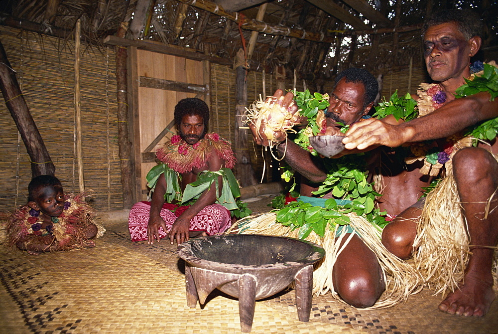 A group of men and a boy at a kava ceremony in Daloma Village on Yasawa Island, Fiji, Pacific Islands, Pacific