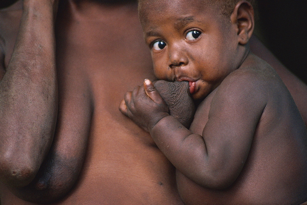 Mother breast-feeding, Tanna Island, Vanuatu, Pacific Islands, Pacific