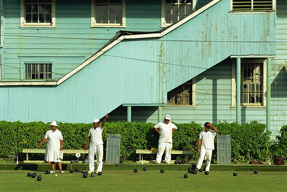 Men and women on a bowling green in Apia on the island of Upolu in Western Samoa, Pacific