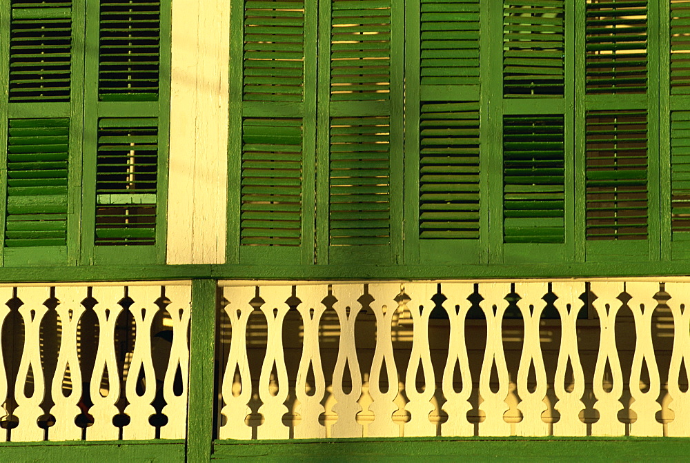 Detail of facade of a wooden colonial building in Belize City, Belize, Central America