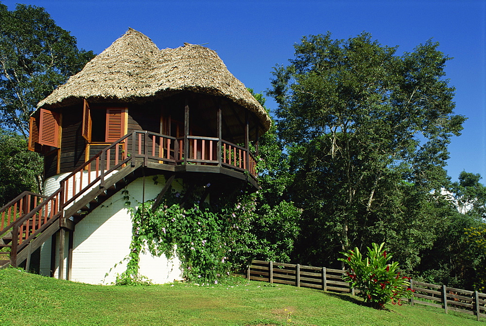 A guest cottage in the gardens of Chaa Creek Cottages in Belize, Central America