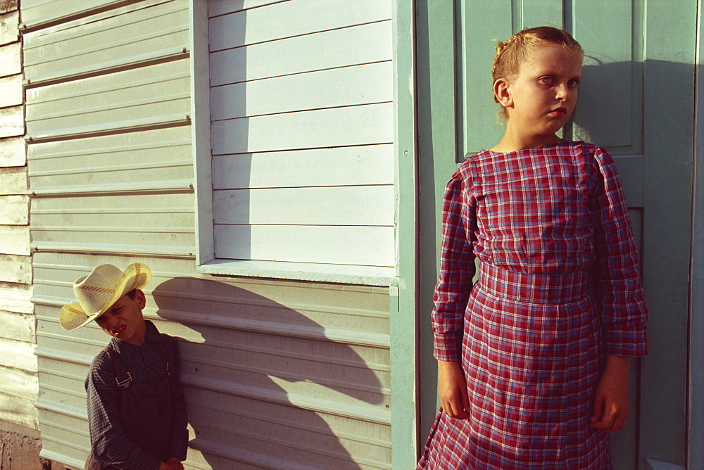 Traditional Mennonite girl and boy, Camp 9, Shipyard, Belize, Central America