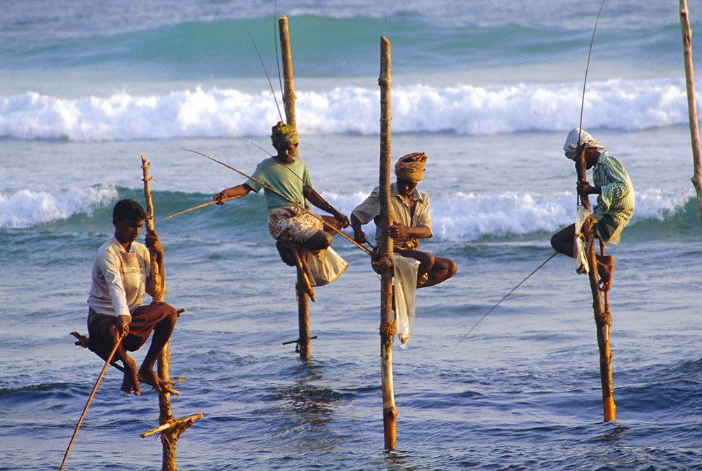 Stilt fishermen, Weligama, Sri Lanka, Asia