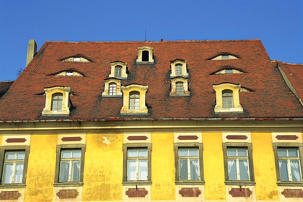 Close-up of dormer windows in the roof of a building in the market square of the medieval town of Cheb in Bohemia, Czech Republic, Europe