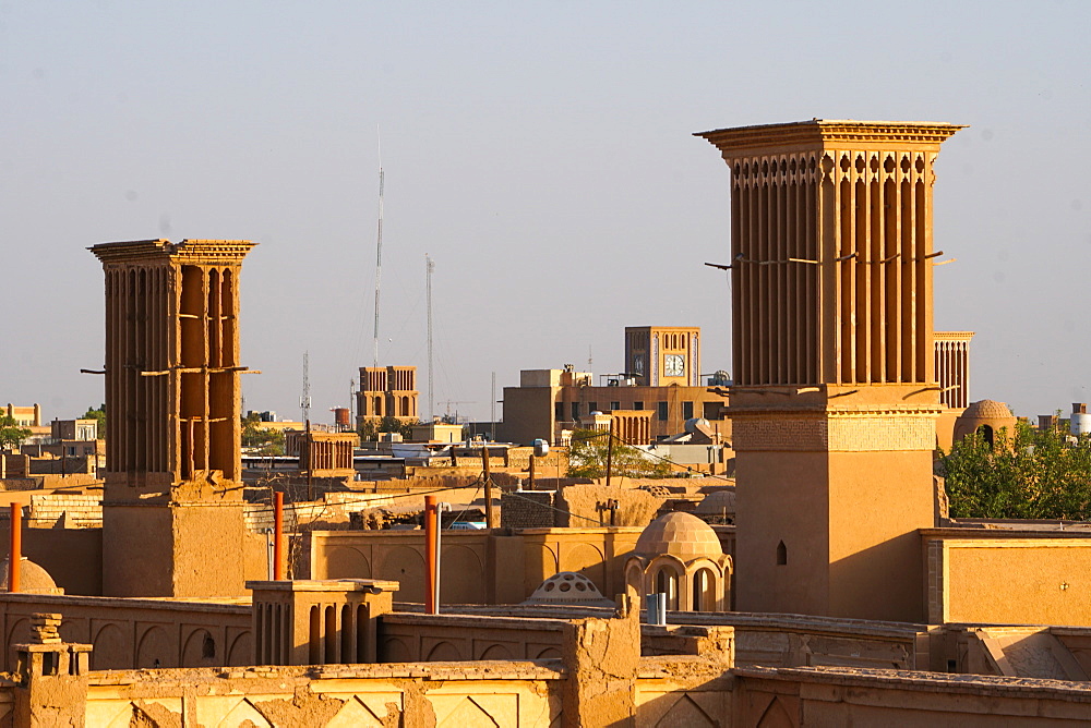 Cityscape at dusk with many windtowers (badgirs), Yazd, Iran, Middle East