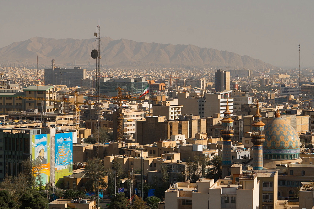 View over buildings from city centre towards Alborz Mountains, Tehran, Iran, Middle East