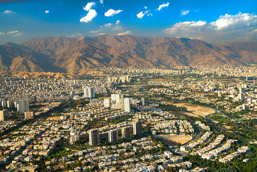 Aerial view of Tehran facing North towards the Alborz Mountains, Tehran, Iran, Middle East