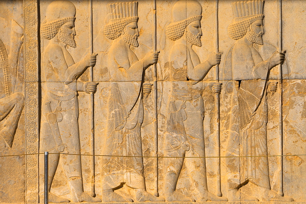 Carved relief of Royal Persian guard, Apadana Palace, Persepolis, UNESCO World Heritage Site, Iran, Middle East