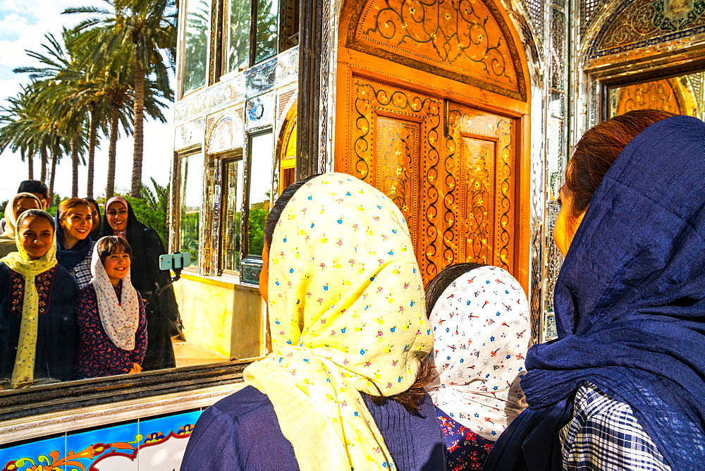 Family taking a selfie in Bagh-e Narajestan (Citrus Garden), Shiraz, Iran, Middle East