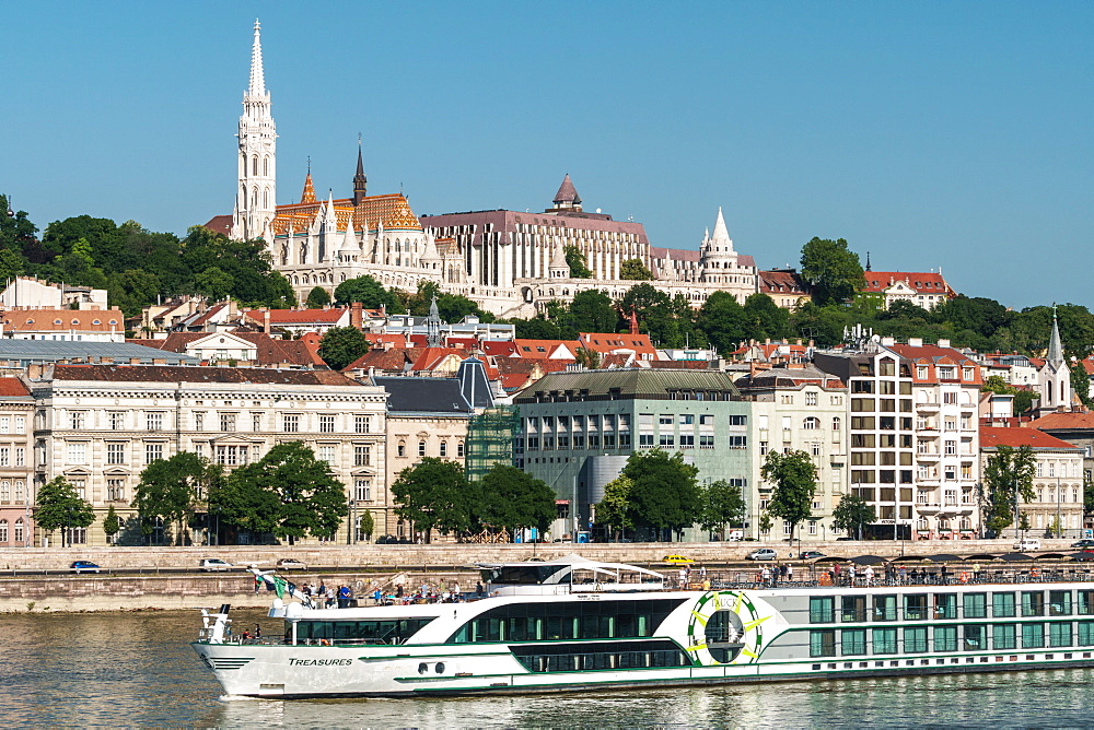 Castle Hill with Matthias Church and Fishermen's Bastion, UNESCO World Heritage Site, with cruiseboat, Budapest, Hungary, Europe