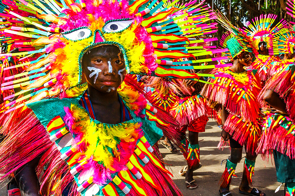 Participants in flamboyant coloured dress waiting to march at the annual Ati-Atihan Festival, Kalibo Island, Philippines, Southeast Asia, Asia