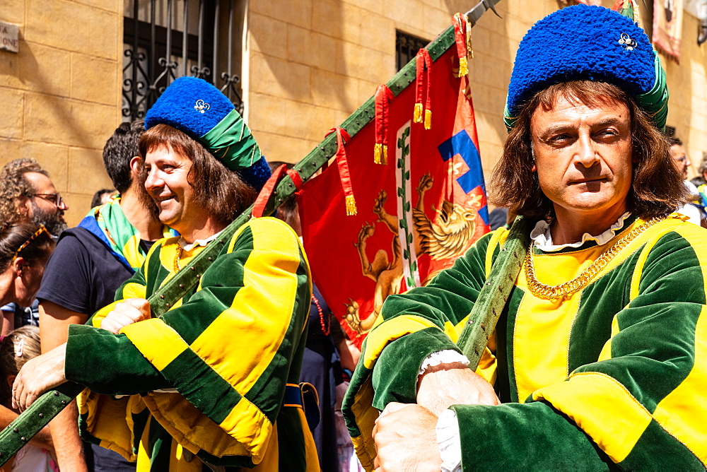 At the pageant that precedes the Palio race, representatives of each neighbourhood parade in traditional costume, Siena, Tuscany, Italy, Europe