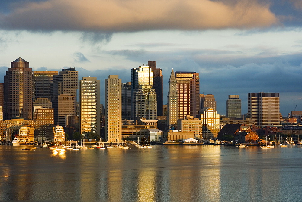 The skyline of the Financial District across Boston Harbor at dawn, Boston, Massachusetts, USA