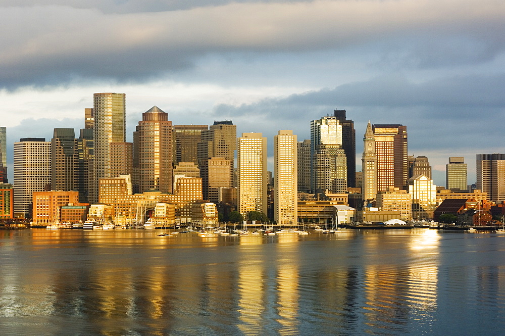 The skyline of the Financial District across Boston Harbor at dawn, Boston, Massachusetts, USA