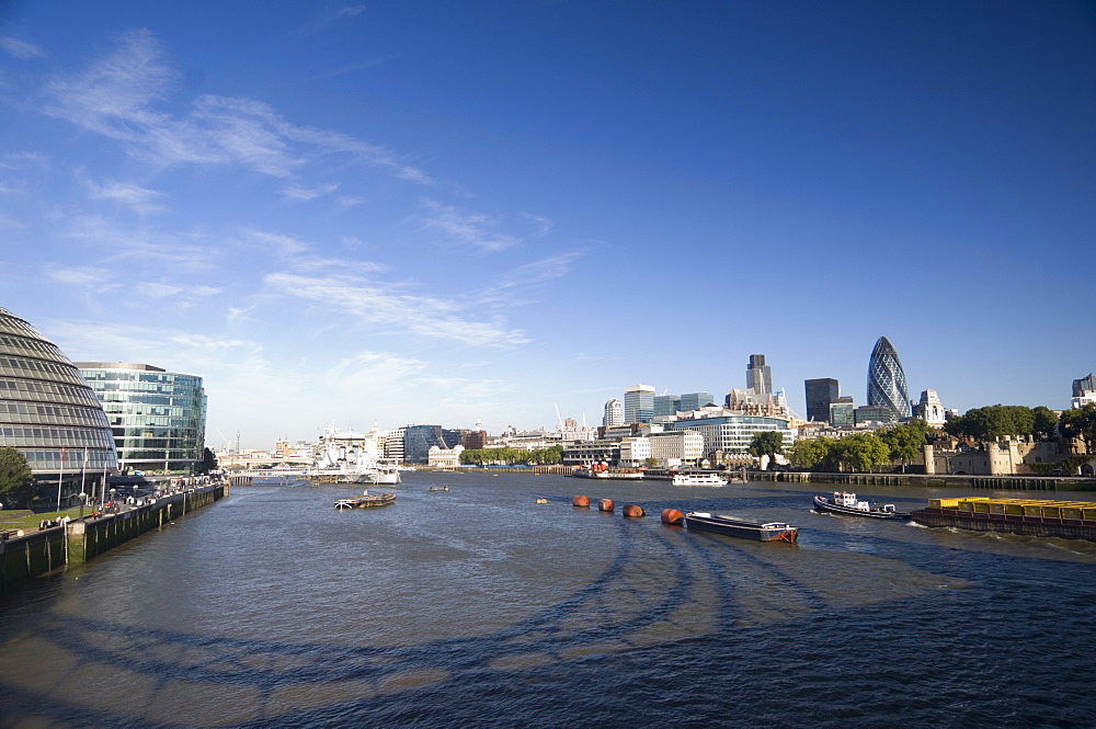 The River Thames, South Bank and City Hall on left, City of London on right, London, England