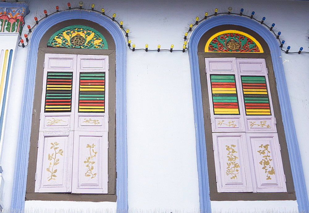 Colourfully painted window shutters in Little India, Singapore, South East Asia