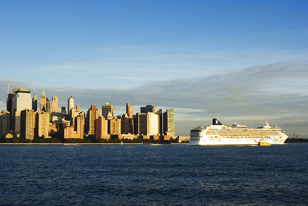 Lower Manhattan skyline and cruise ship across the Hudson River, New York City, New York, United States of America, North America