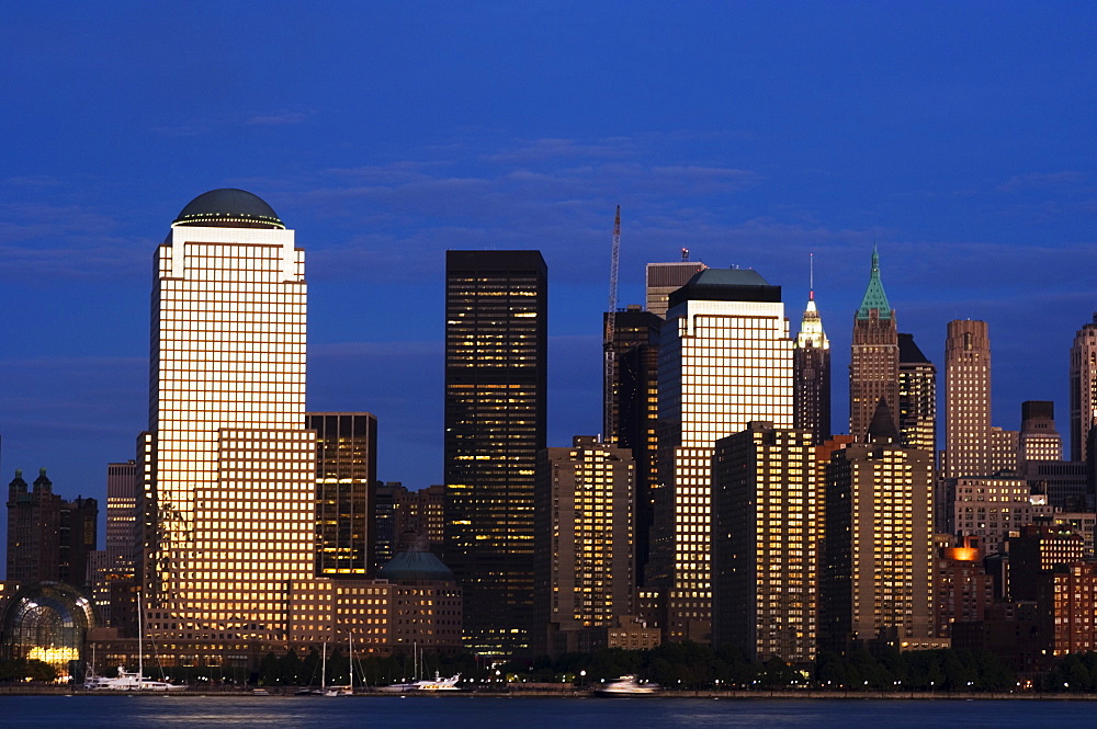 Lower Manhattan skyline at dusk across the Hudson River, New York City, New York, United States of America, North America