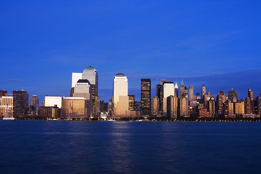 Lower Manhattan skyline at dusk across the Hudson River, New York City, New York, United States of America, North America