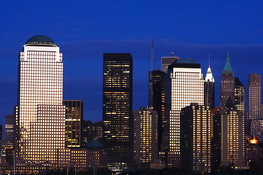 Lower Manhattan skyline at dusk across the Hudson River, New York City, New York, United States of America, North America