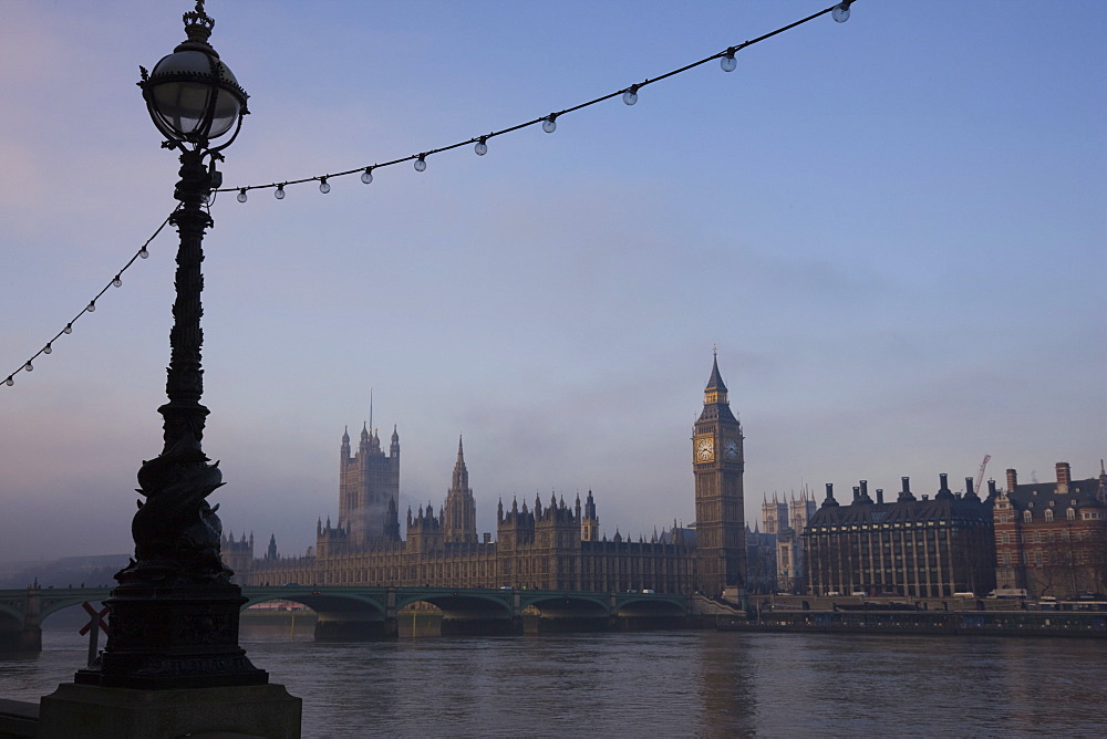 Early misty morning view of Big Ben and the Houses of Parliament across Westminster Bridge, London, England, United Kingdom, Europe