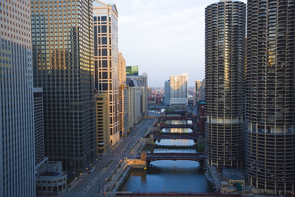 Skyscrapers along the Chicago River and West Wacker Drive at dawn, Marina City on the right, Chicago, Illinois, United States of America, North America