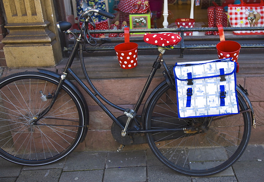 Old bicycle with a Delft design saddlebag. Amsterdam, Netherlands, Europe