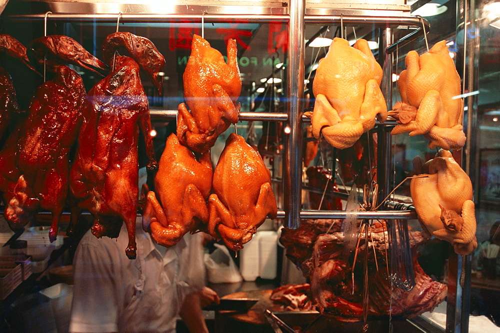 Cooked Peking duck displayed in restaurant window, Hong Kong, China, Asia