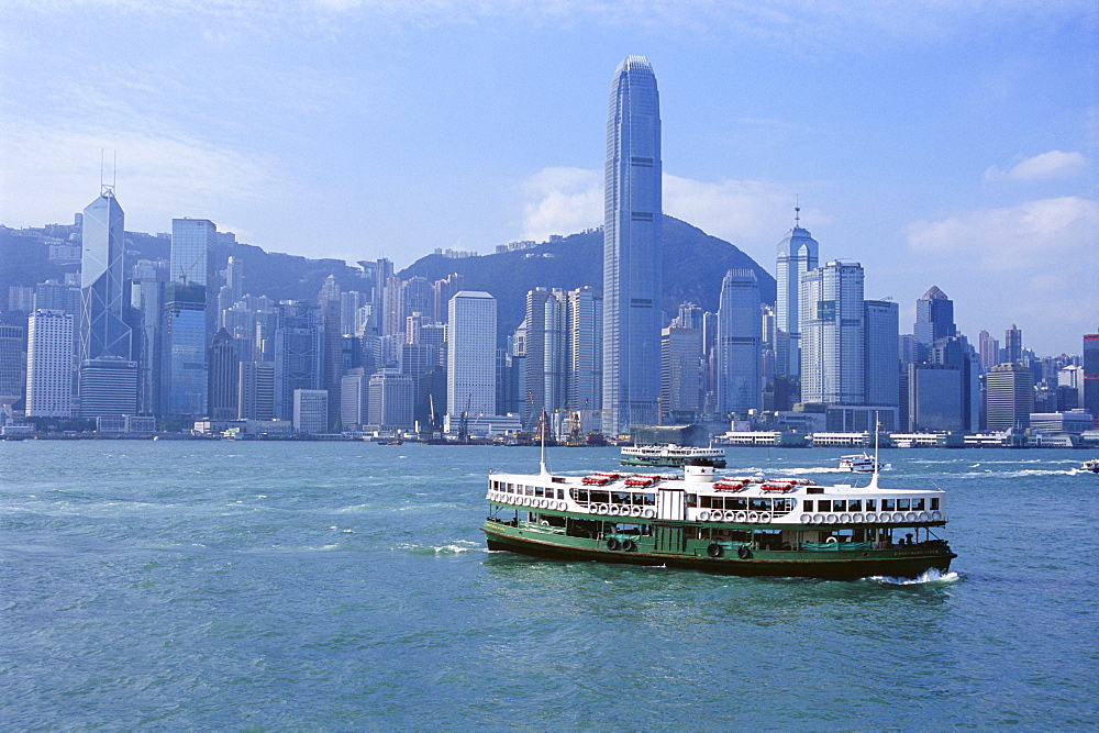 Star Ferry crossing Victoria Harbour towards Hong Kong Island, with Central skyline beyond, Hong Kong, China, Asia