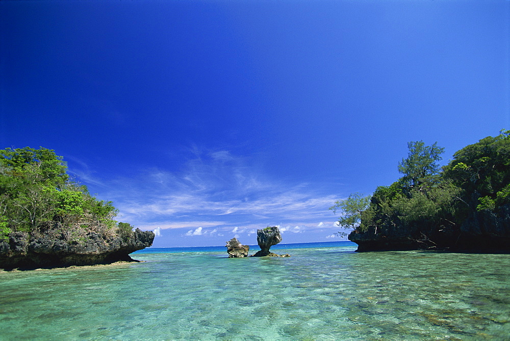 Sheltered lagoon and limestone islet, Lau group (Exploring Isles), Northern Lau Group. Fiji, Pacific Islands, Pacific