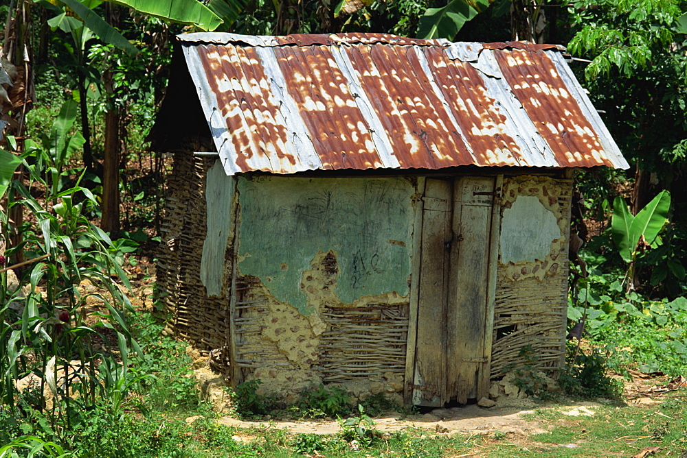 Typical rural shack of plaster, wattle, and daub construction, Milot, Haiti, West Indies, Caribbean, Central America