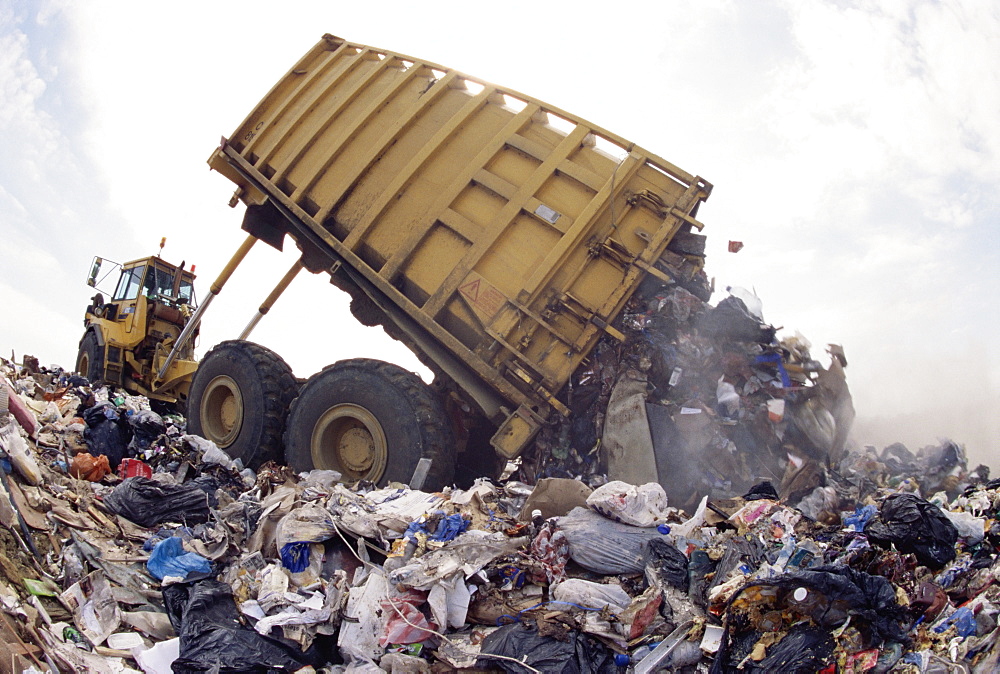 Lorry arrives at waste tipping area at landfill site, Mucking, London, England, United Kingdom, Europe