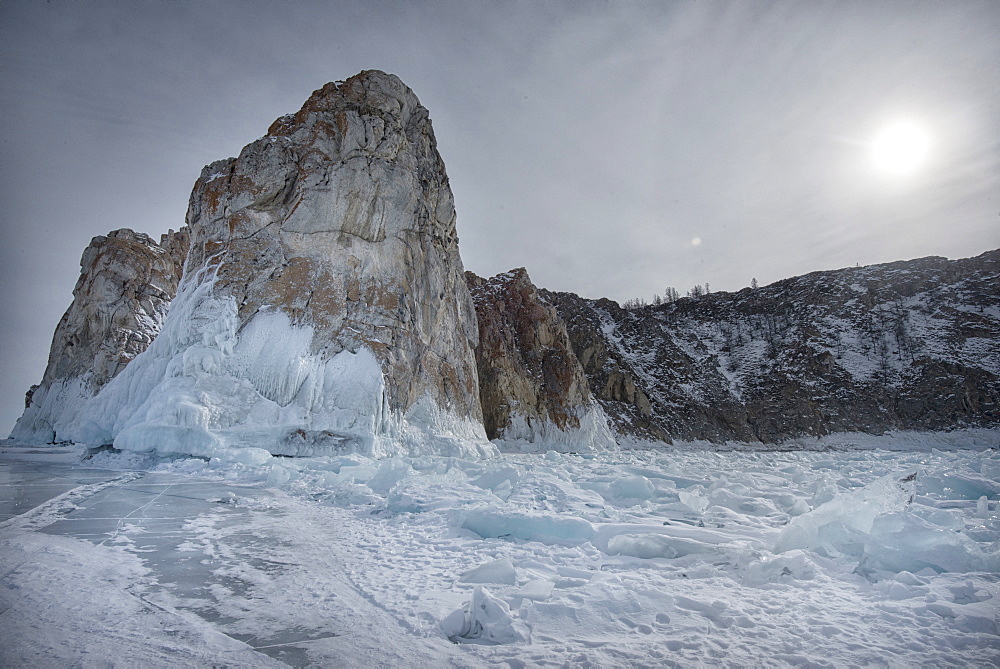 Rough ice formed at Shaman Rock, Olkhon Island as the waves freeze at the beginning of winter, Lake Baikal, Irkutsk Oblast, Siberia, Russia, Eurasia