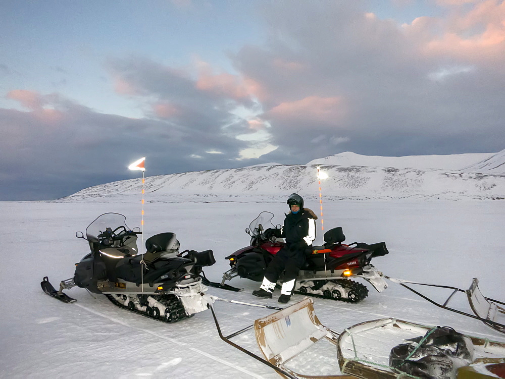 Tourists on snowmobiles (skidoos) near Barentsburg, Svalbard, Arctic, Norway, Scandinavia, Europe