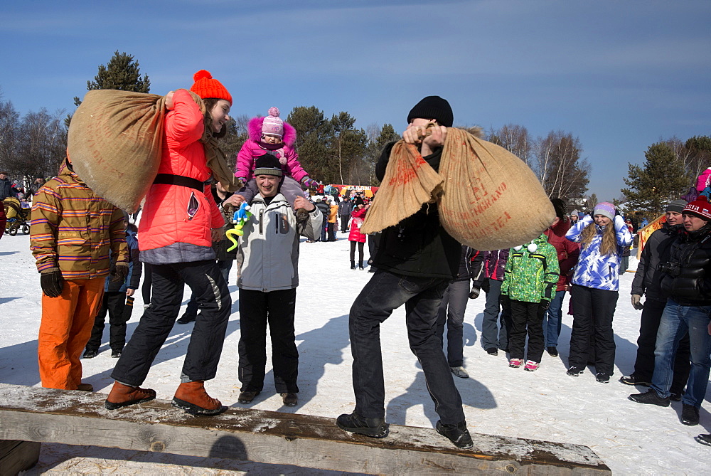 Siberians celebrate the festival of Maslenitsa with outdoor games, Irkutsk, Siberia, Russia, Eurasia