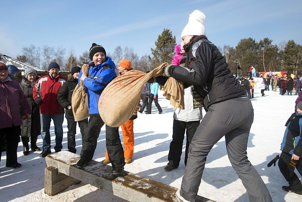 Siberians celebrate the festival of Maslenitsa with outdoor games, Irkutsk, Siberia, Russia, Eurasia