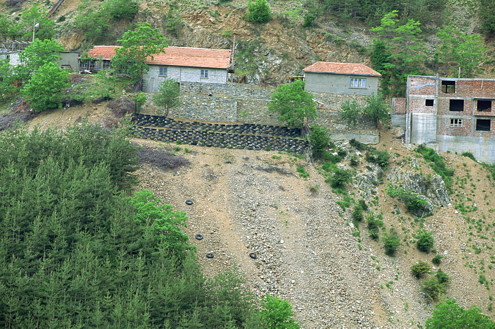 Old tyres used to form terracing in attempt to halt erosion, near Ernareka, Bulgaria, Europe