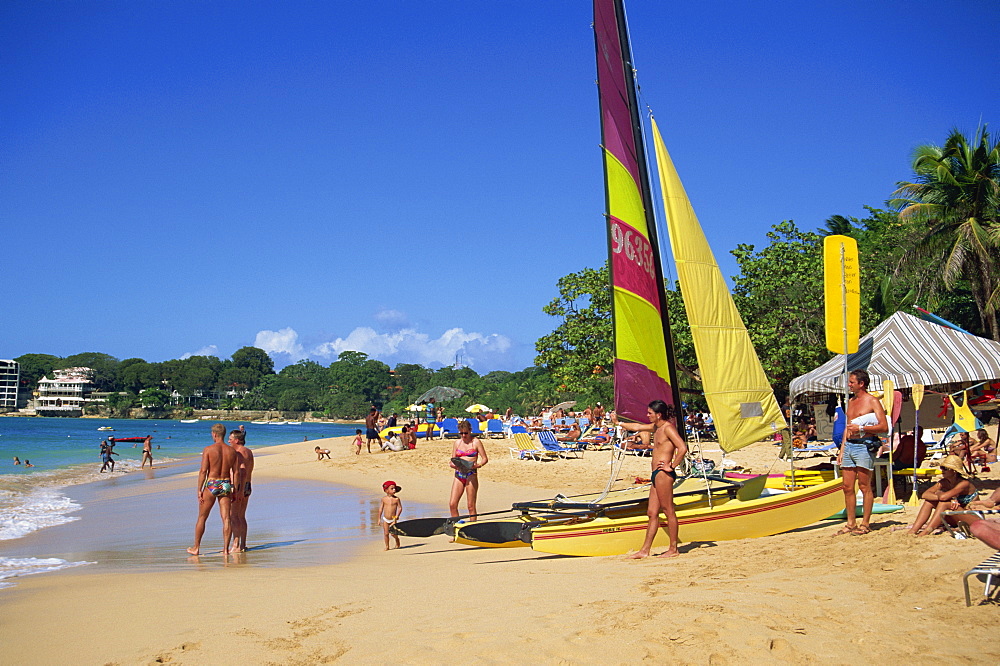 Tourists on the beach at Sosua, Dominican Republic, West Indies, Caribbean, Central America