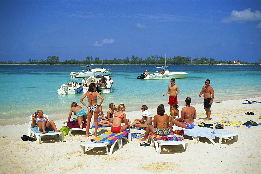 Group of tourists on beach, Western Esplanade, Nassau, Bahamas, West Indies, Central America