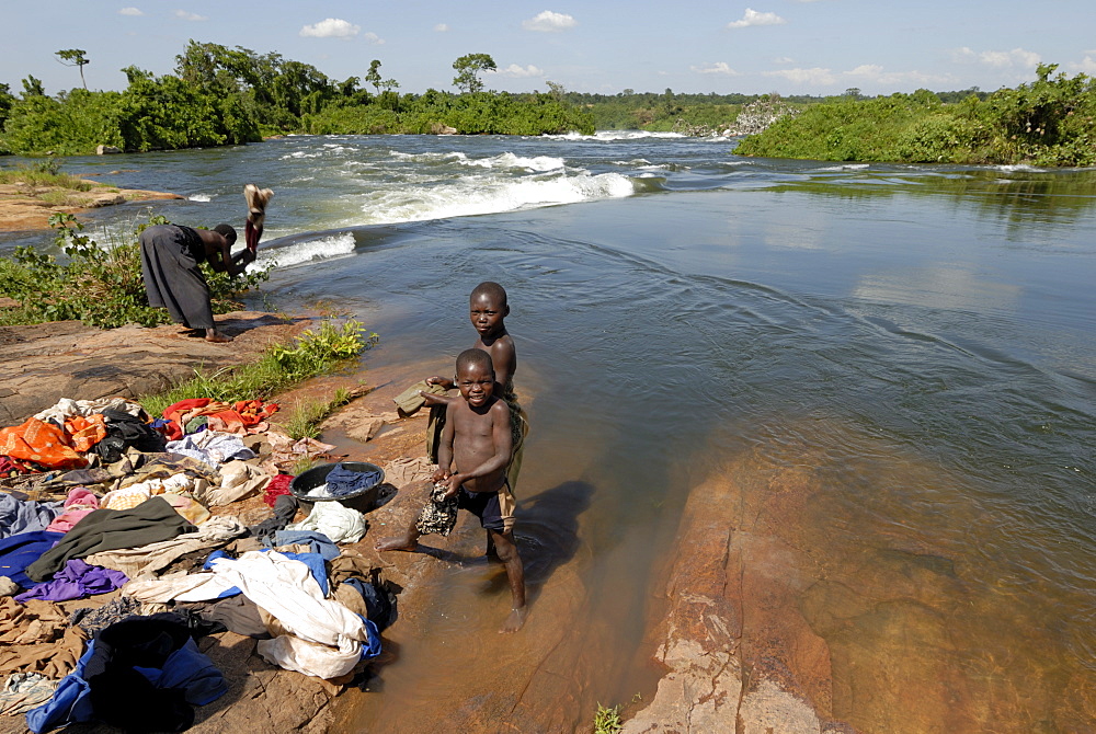 Locals washing their laundry in the Nile, Uganda, East Africa, Africa