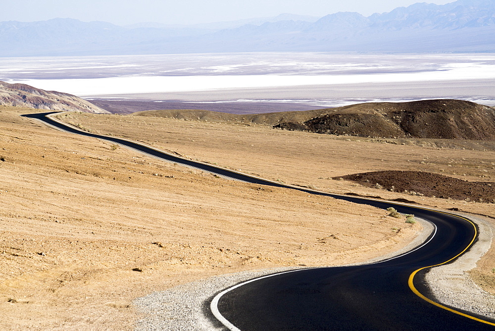 Black tarmac road, Death Valley National Park, California, United States of America, North America