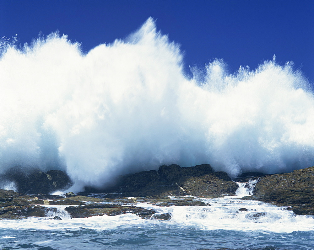 Waves crashing on rocks on the coast of South Africa, Africa